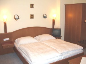 Comfort double with mountain view, balcony, private facilities (shower), and breakfast